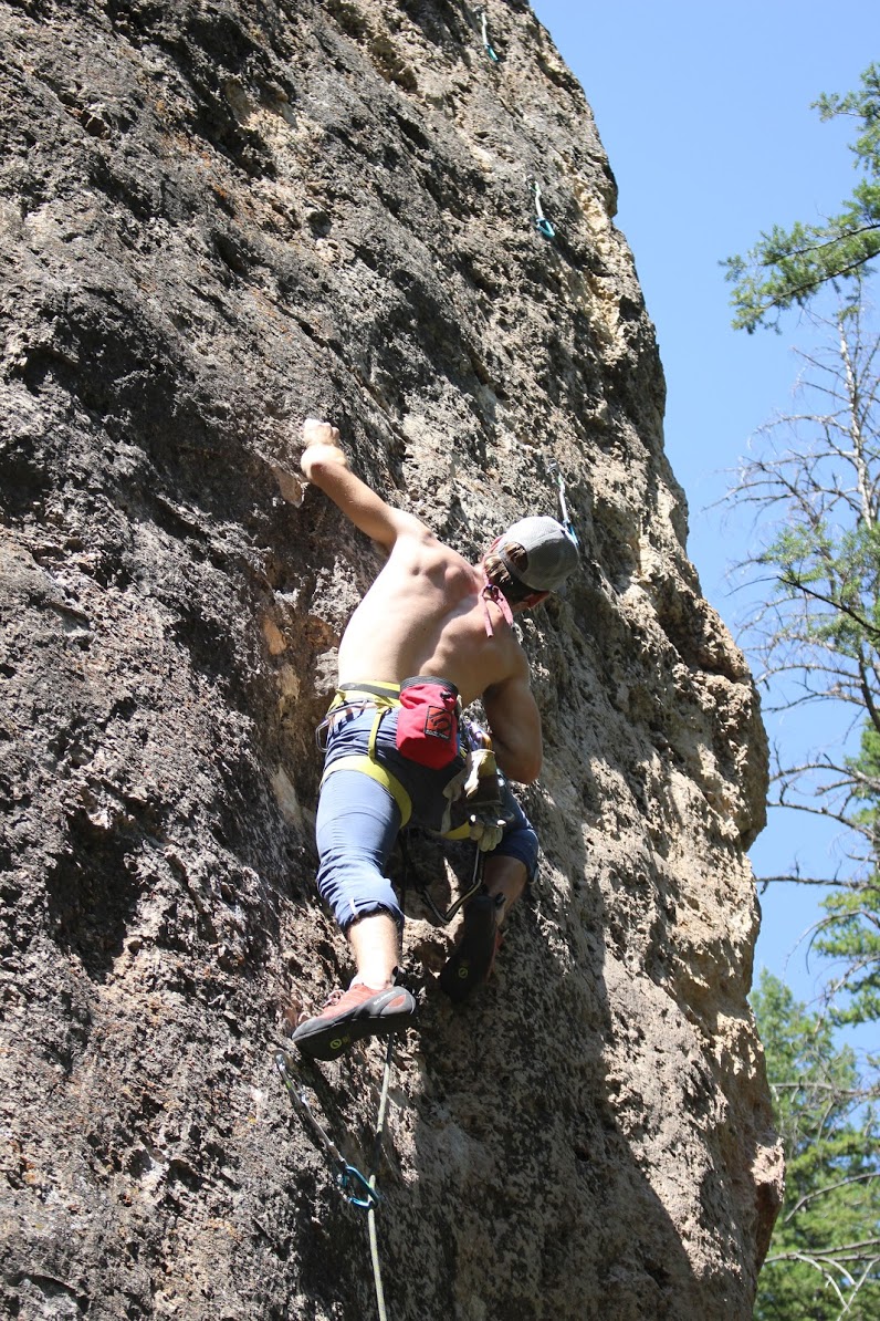 Michael climbing a high 10